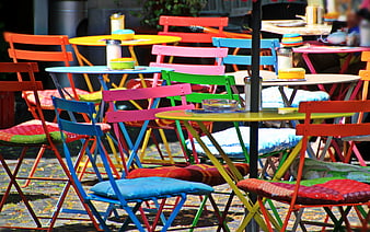 Colorful Outdoor Bistro Chairs and Tables on Terrace