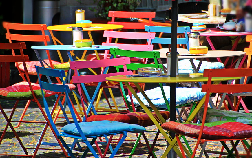 Colorful Outdoor Bistro Chairs and Tables on Terrace