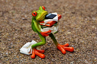 Green Frog Figurine Holding Stack of Papers and Calculator