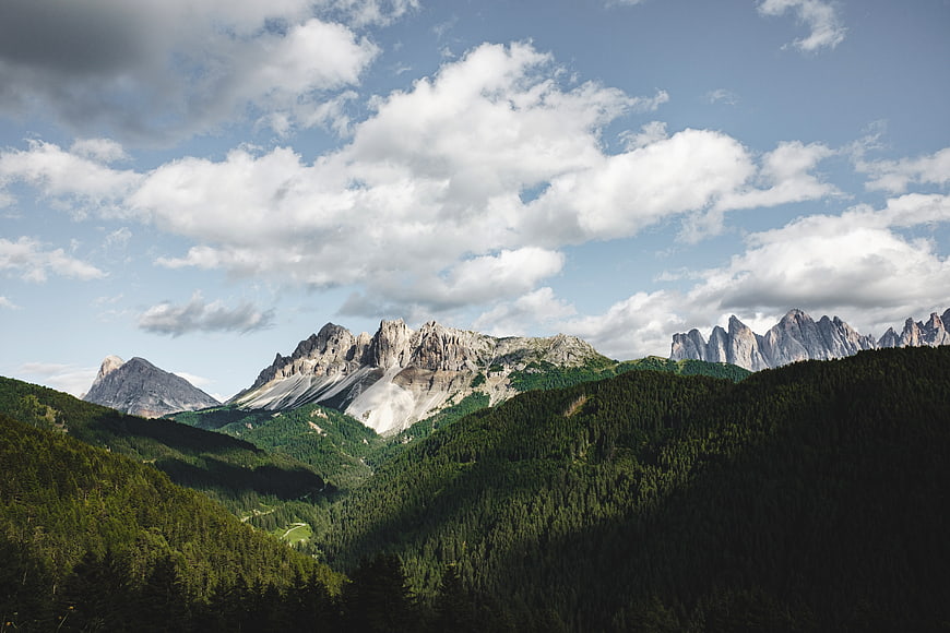 Dramatic Dolomites Mountain Landscape with Forested Valleys