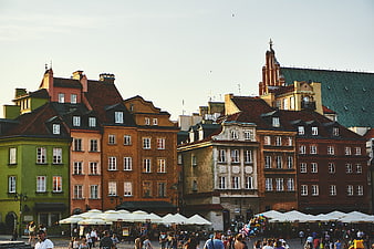Colorful historic buildings in a bustling European city square