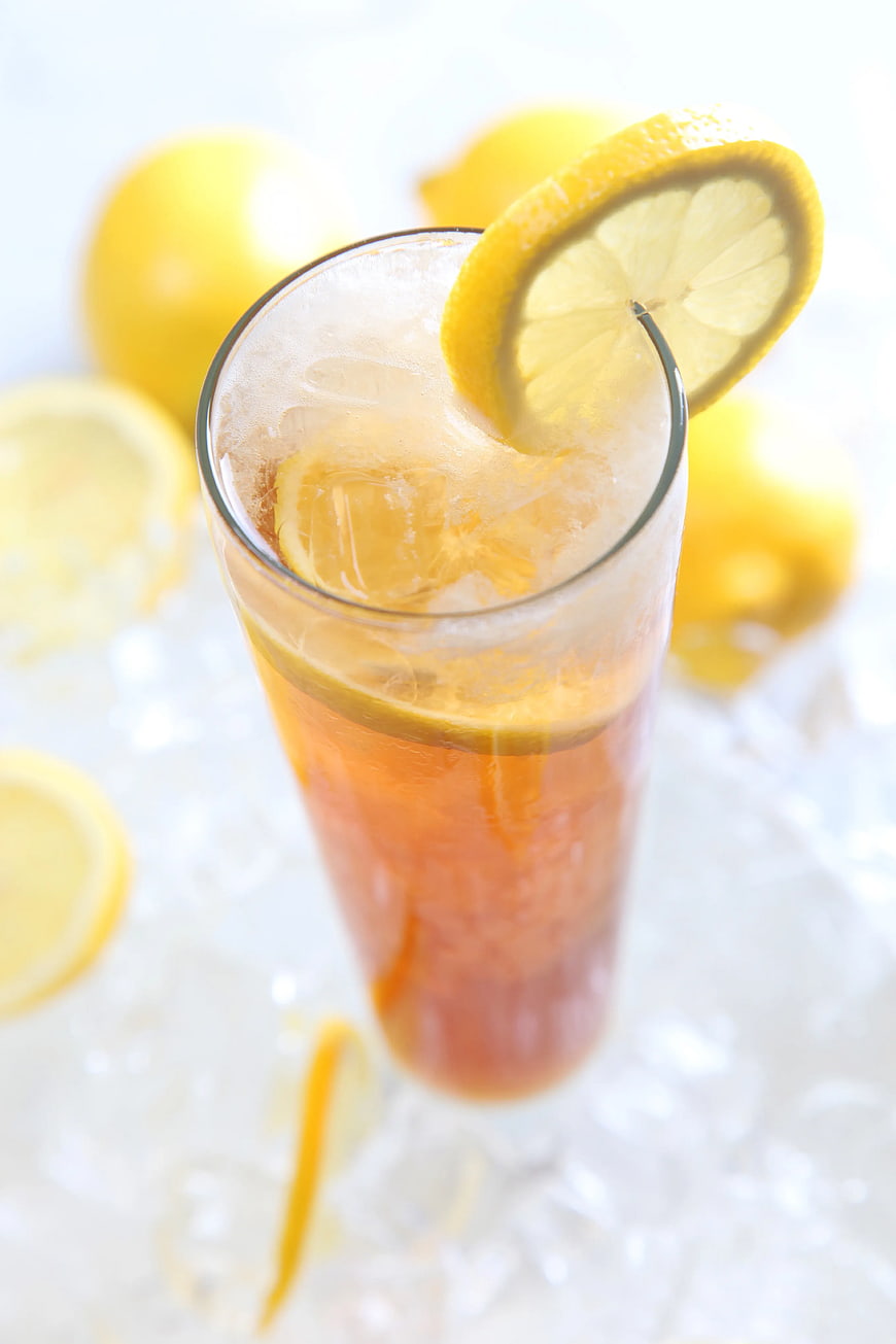 Refreshing Iced Tea with Lemon Garnish in Highball Glass