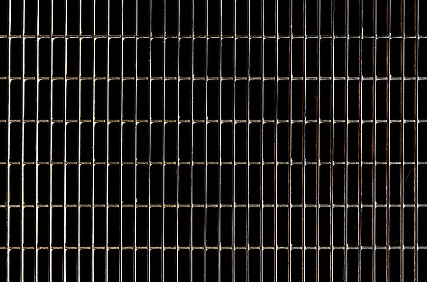 Abstract Metal Grid Pattern on Black Background