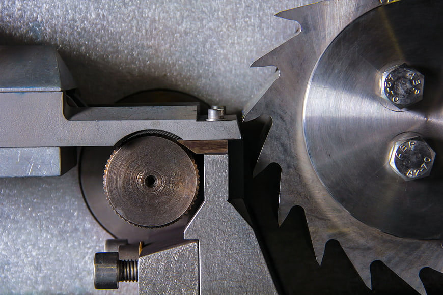 Close-up of industrial metal gears and mechanical machinery parts