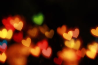 Abstract Heart-Shaped Bokeh Lights on Dark Background