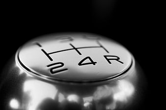 Close-up of Manual Gear Shift Knob in Black and White