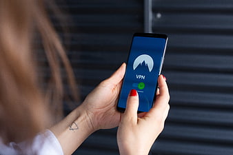 Woman using VPN app on smartphone for internet security