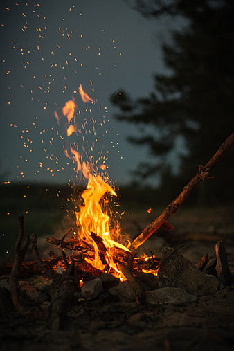Campfire with Sparks Flying at Dusk