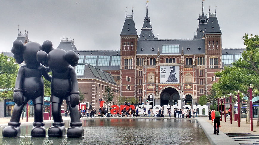 KAWS sculptures in front of Rijksmuseum Amsterdam