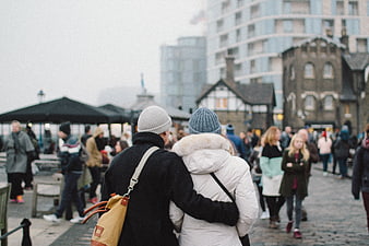 Couple Walking in Winter City Street