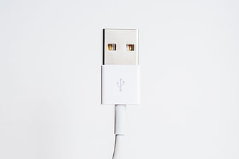 Close-up of White USB Connector on White Background
