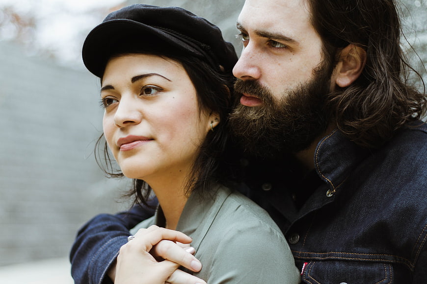 Intimate Portrait of Romantic Couple Embracing Outdoors