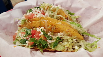 Fresh Mexican Tacos with Lettuce, Tomato, and Cheese