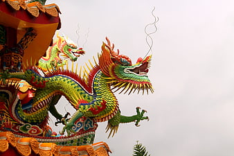 Colorful Chinese Dragon Sculpture On Temple Roof