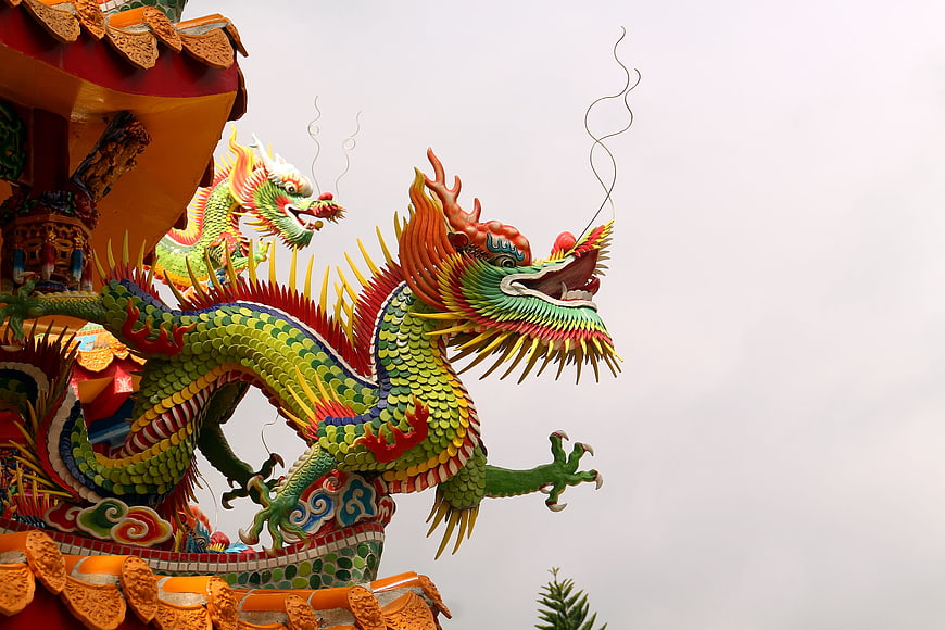 Colorful Chinese Dragon Sculpture On Temple Roof