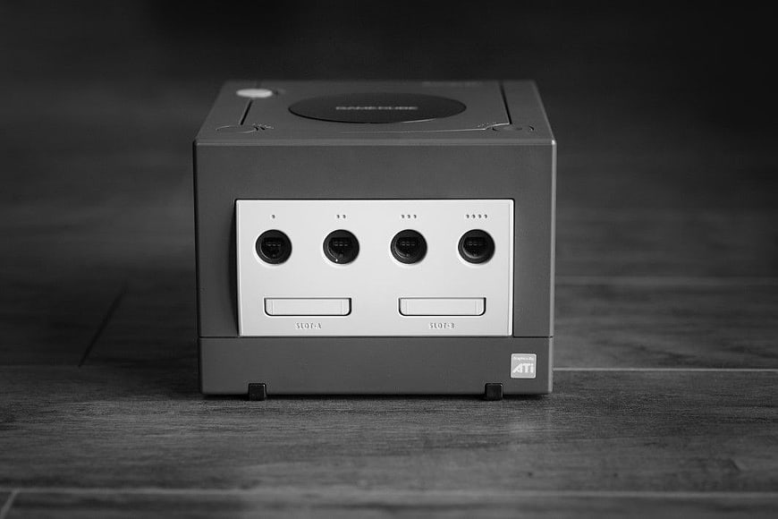Retro Nintendo GameCube Console on Wooden Floor