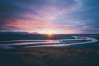 Aerial View of Braided River at Sunset in Iceland