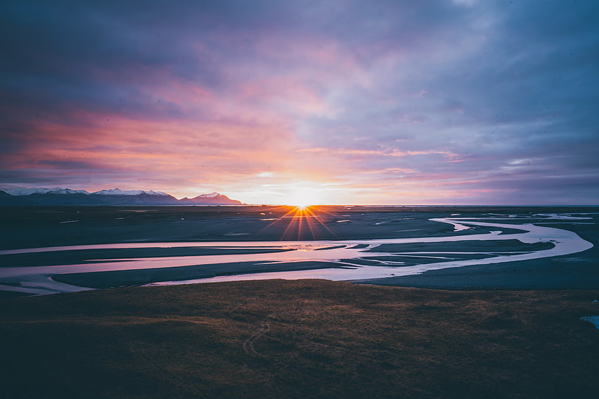 Aerial View of Braided River at Sunset in Iceland