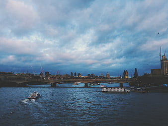 London Skyline and River Thames at Dusk with Boats