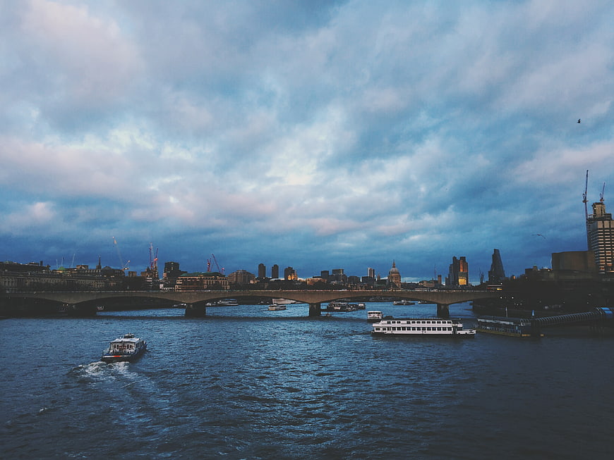 London Skyline and River Thames at Dusk with Boats