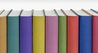 Colorful Hardcover Books Spines on White Background