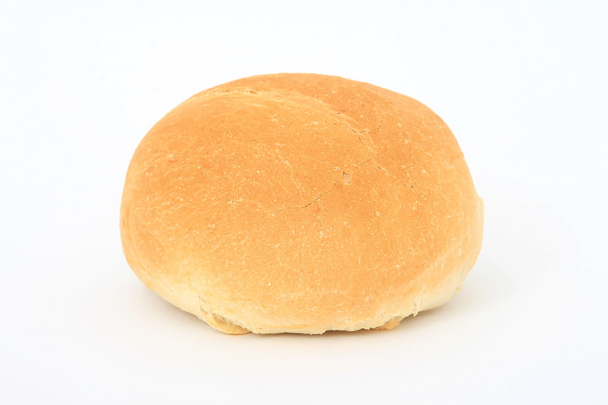 Golden Brown Bread Roll Isolated on White Background