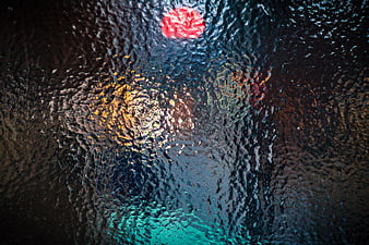 Abstract textured glass with colorful light refractions