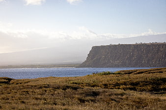 Scenic coastal landscape with rugged cliffs and ocean view