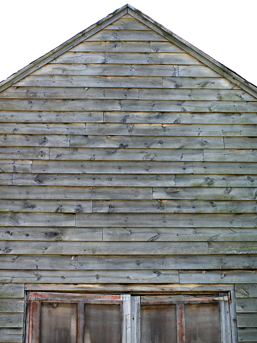 Weathered Wooden Barn Exterior with Rustic Texture