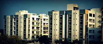 Modern Apartment Complex with Blue and White Facade