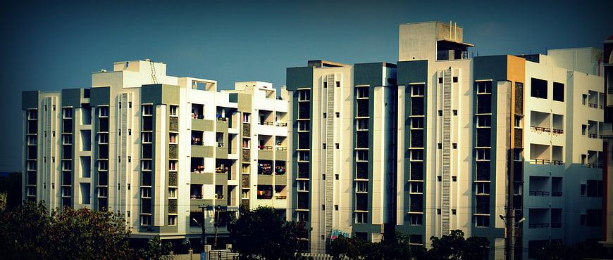 Modern Apartment Complex with Blue and White Facade