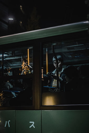 Passengers on a Night Bus in Japan