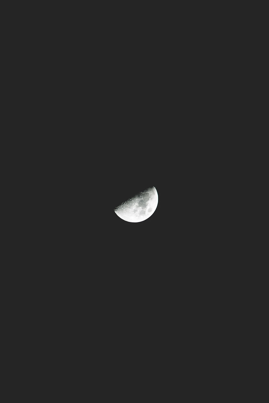 Crescent Moon in Dark Night Sky