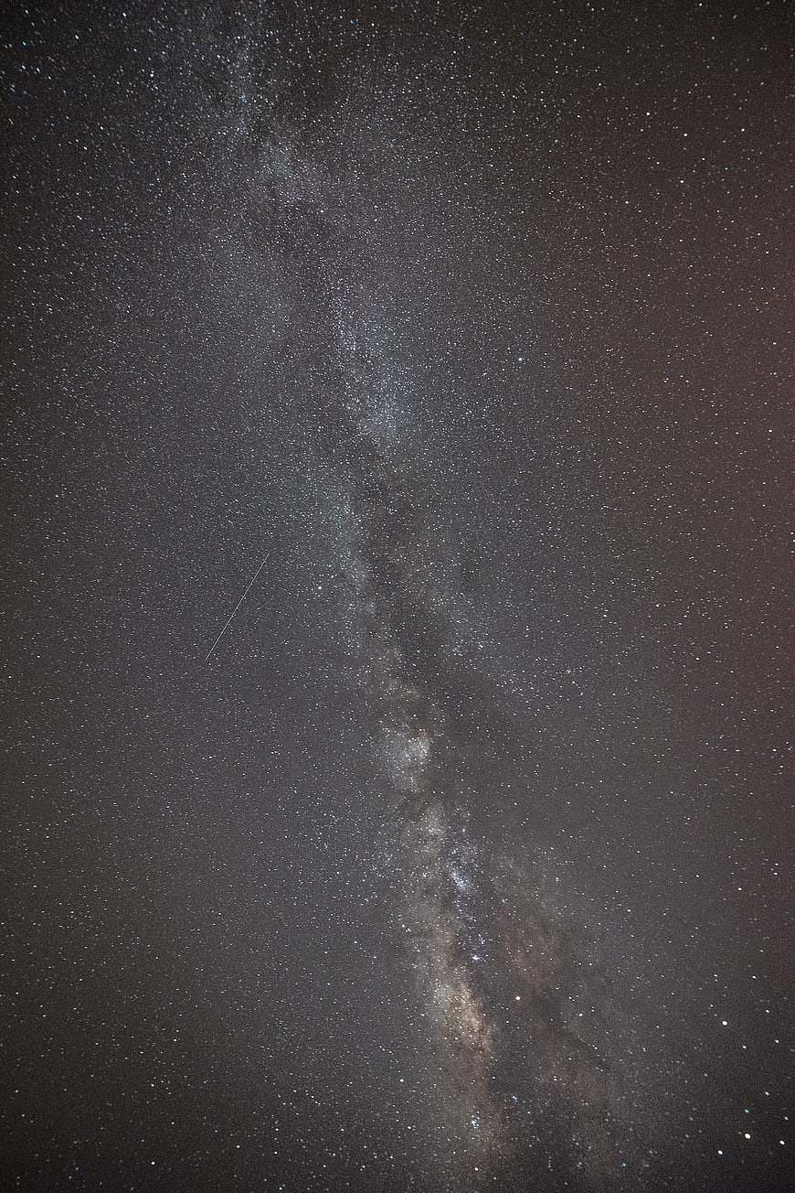 Milky Way Galaxy Night Sky with Stars and Meteor