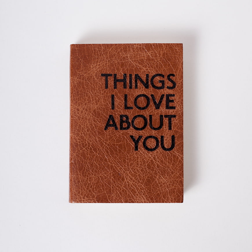 Brown leather journal with 'Things I Love About You' text