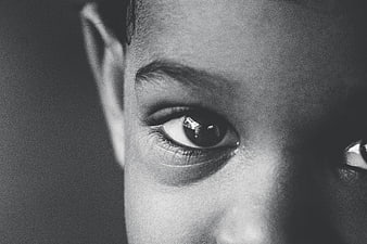 Black and White Close Up Portrait of Young Child Eyes