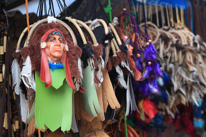 Colorful Native American Style Masks Hanging for Sale