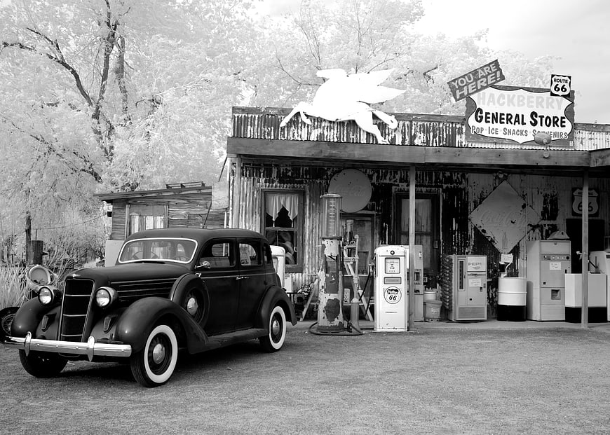 Vintage black car at Route 66 gas station infrared photo