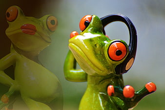 Cute Green Ceramic Frog Figurine Wearing Black Headphones