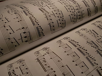 Close-up of Open Sheet Music with Piano Notes