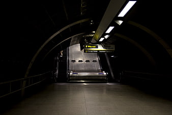 Empty Underground Metro Station Escalator at Night