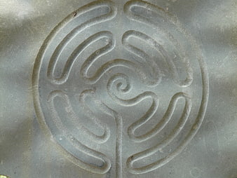 Carved Stone Labyrinth Symbol Close-Up