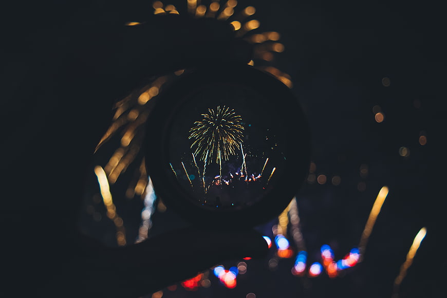 Fireworks Reflected in Snow Globe at Night
