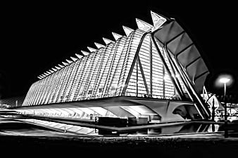 Black and white night view of modern architectural structure