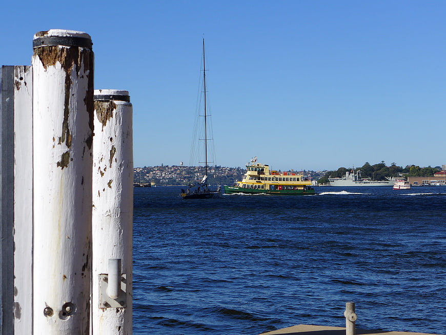 Sydney Harbour Ferry and Sailboat with Weathered Wharf Piles