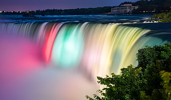 Illuminated Niagara Falls Waterfall at Dusk with Colorful Lights