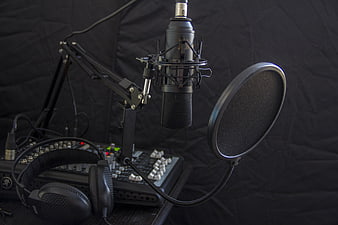 Professional Studio Microphone, Headphones, and Audio Mixer Setup