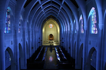 Blue Gothic Church Interior with Stained Glass Windows