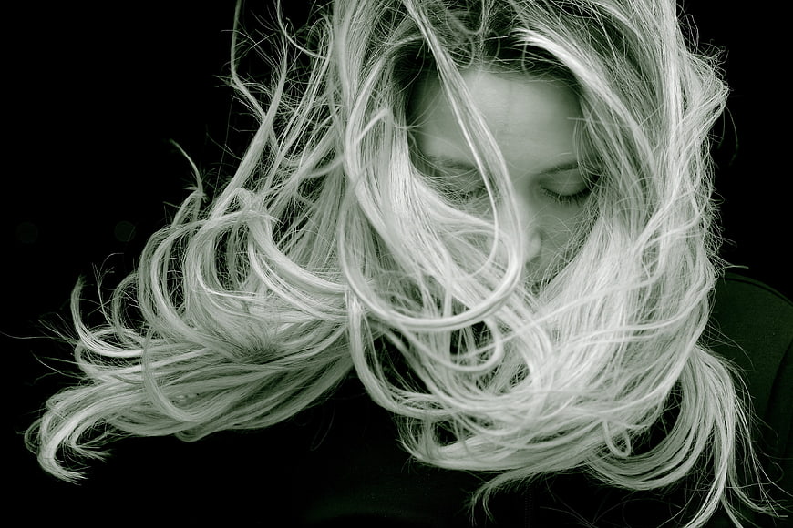 Dramatic Black and White Portrait of Woman with Flowing Hair