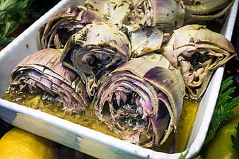 Marinated artichoke hearts in olive oil with herbs